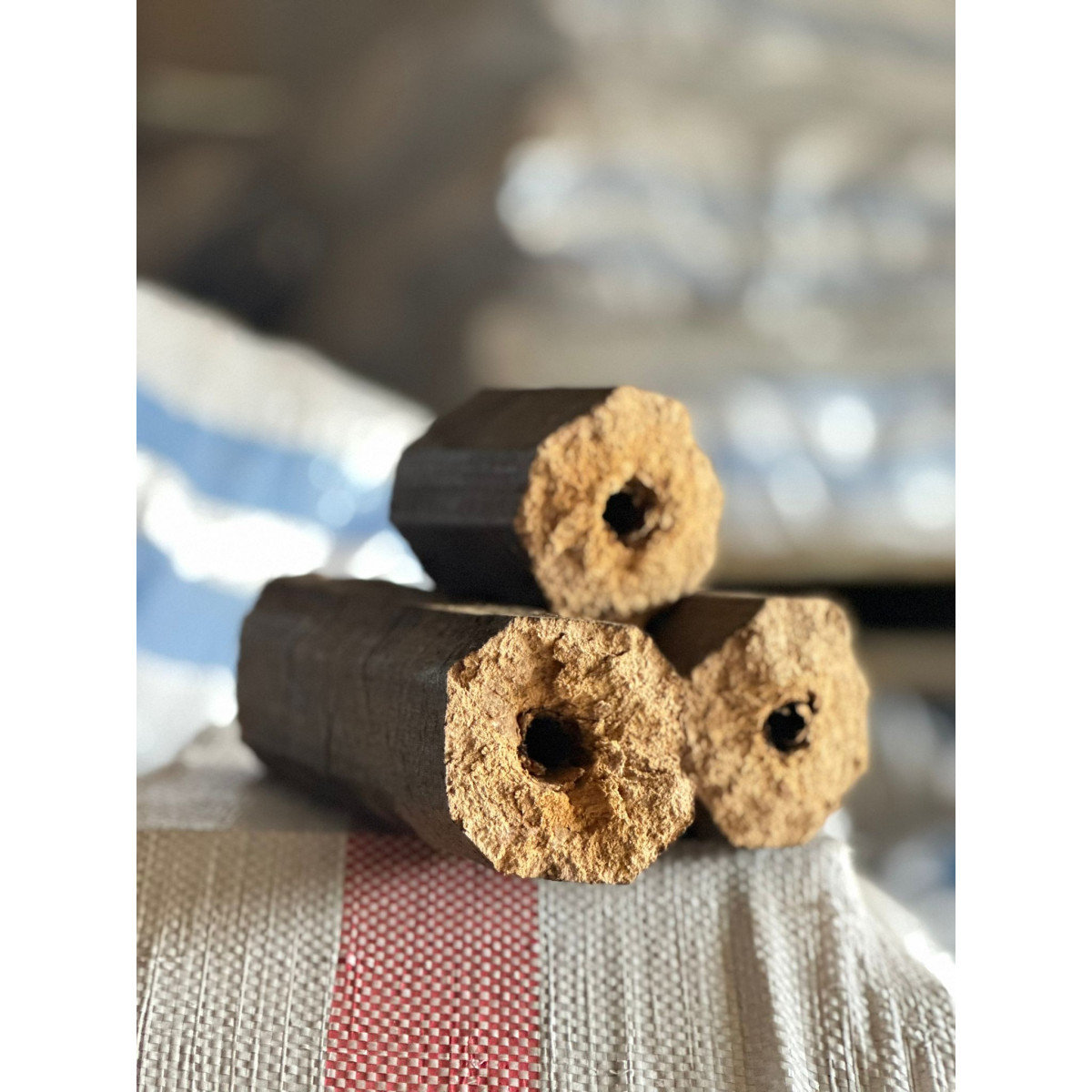 Sacks of BRITEBURN Hazelnut Shell Pini Kay Briquettes
