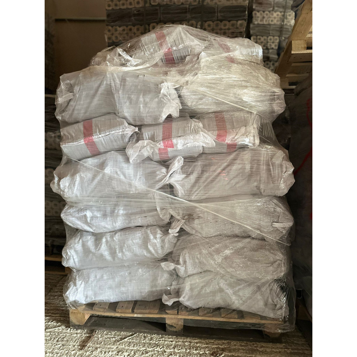 Sacks of BRITEBURN Hazelnut Shell Pini Kay Briquettes
